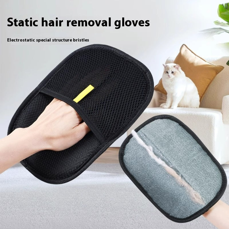Black fabric pet hair mitt with mesh backing and strap